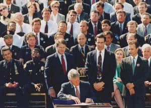 President Clinton signing the 1994 assault weapons ban